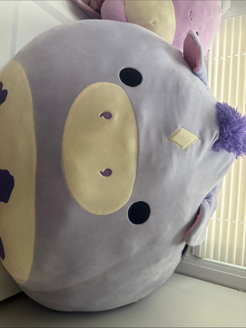 Squishmallows Lavender Unicorn Plush with Cream Accents